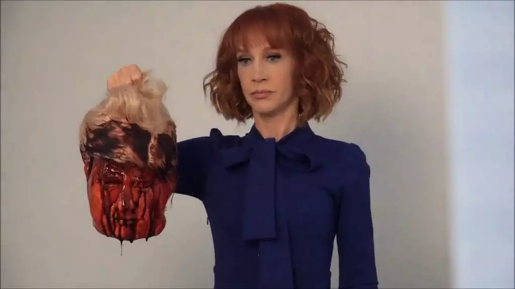kathy holding the head of trump